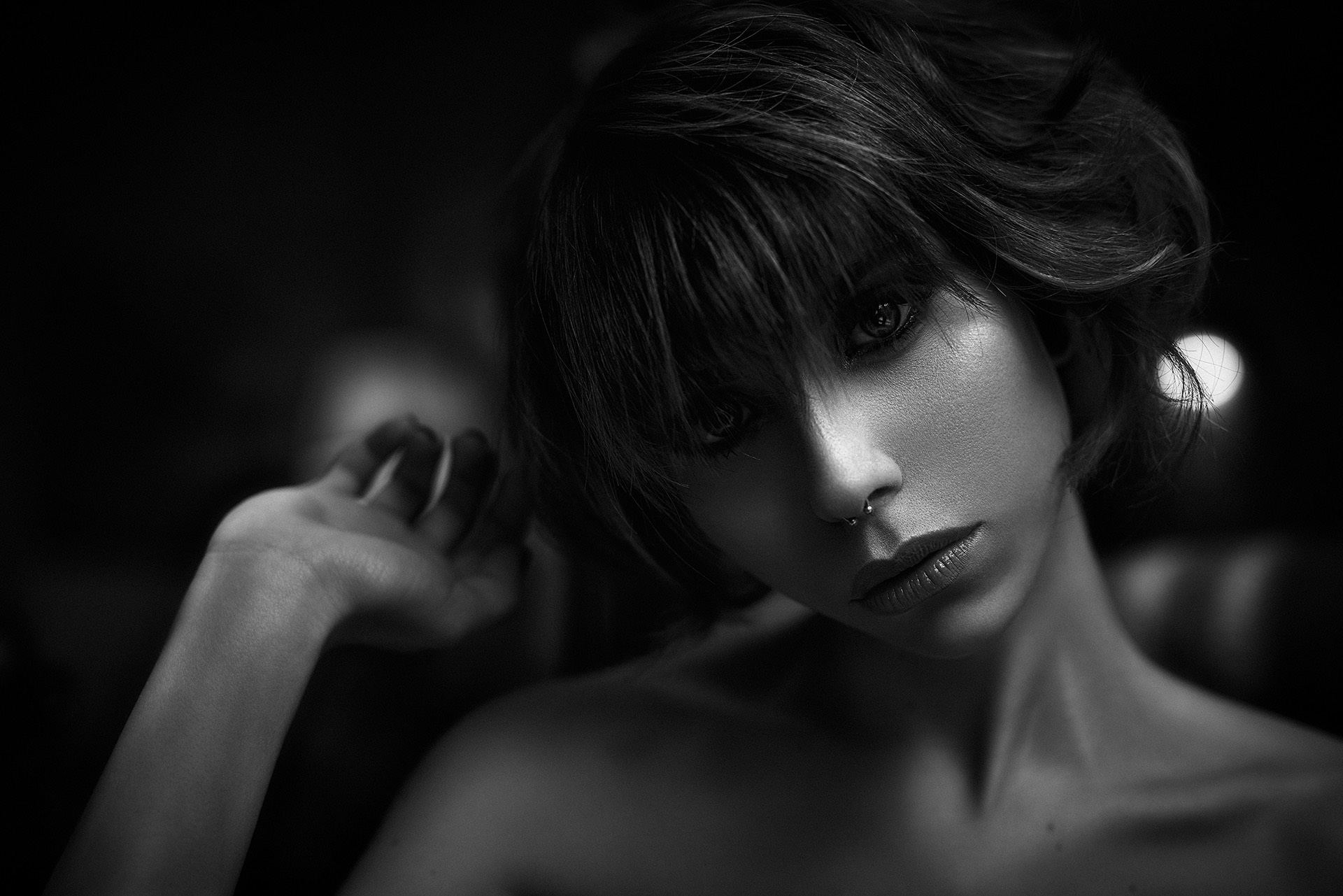 A cinematic black and white beauty portrait in natural light.